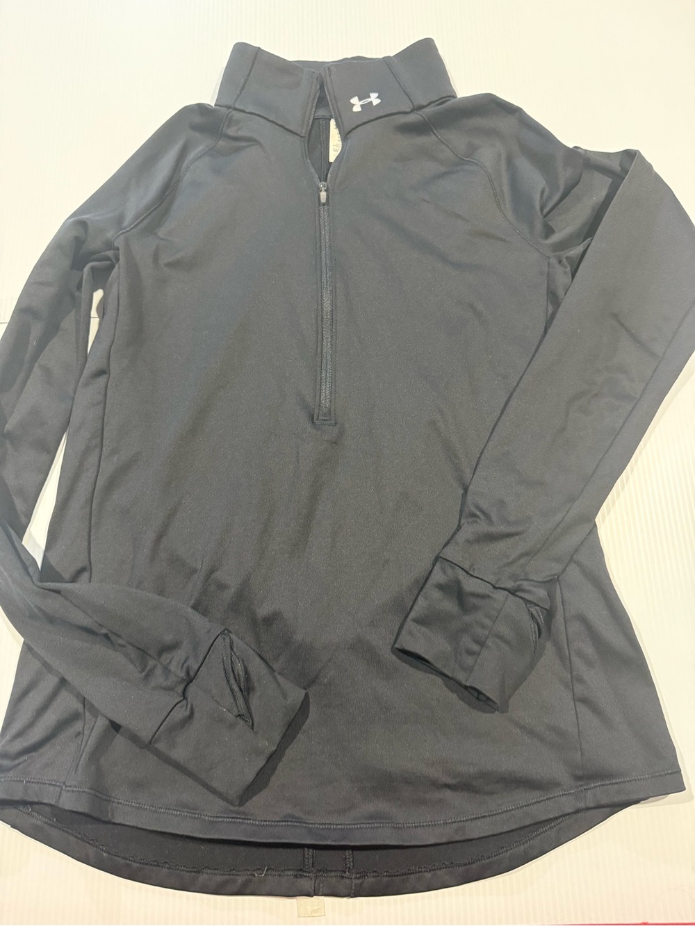 Woman’s Under Armour active half zip